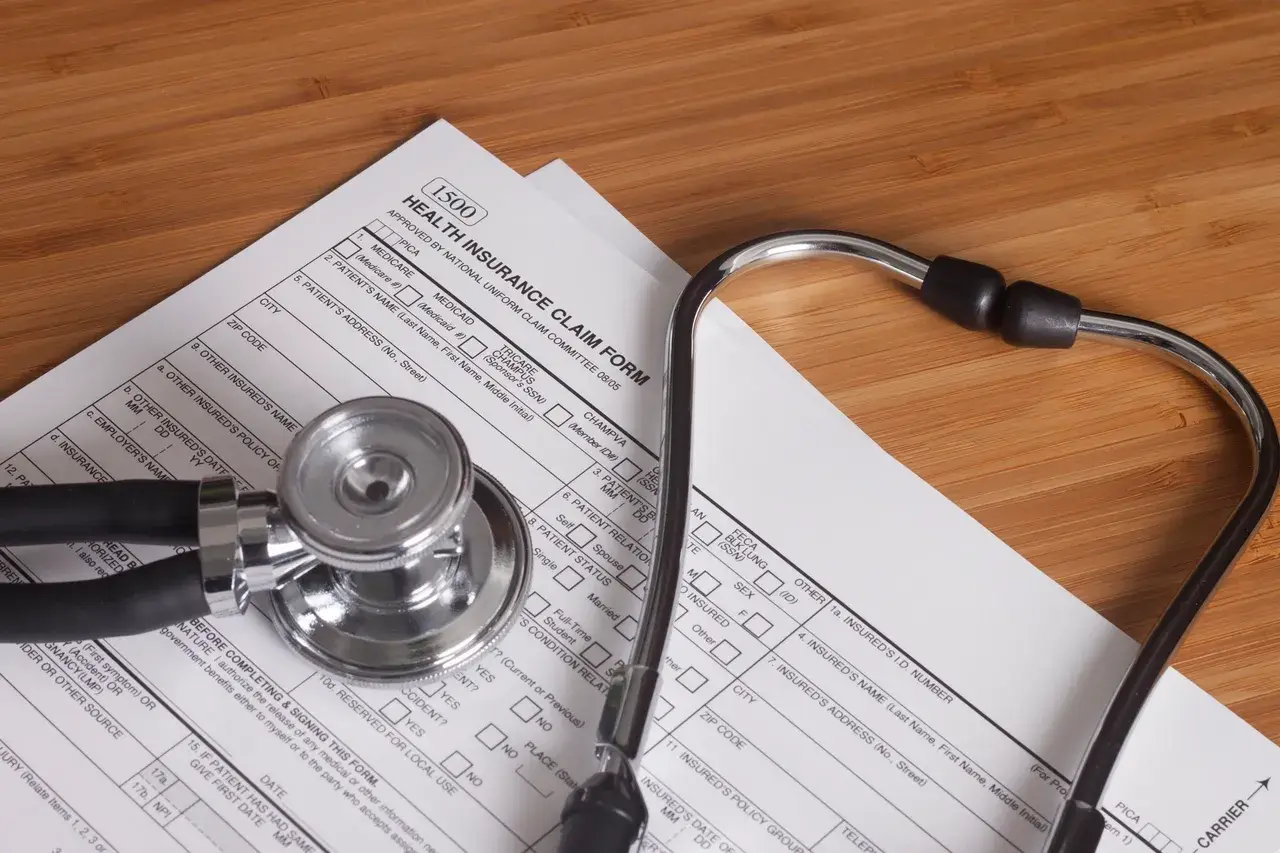An insurance claim form representing the importance of secure patient data management and HIPAA compliance.